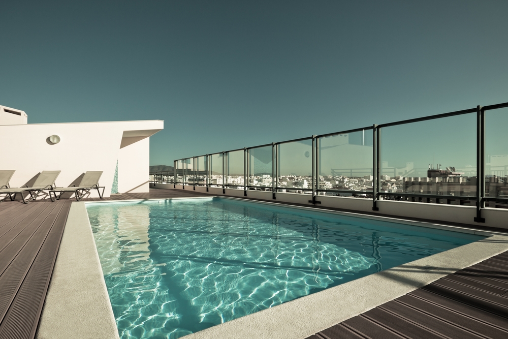 Outdoor,Swimming,Pool,At,The,House,Roof